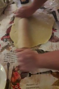 Italian Easter cake rolling the dough
