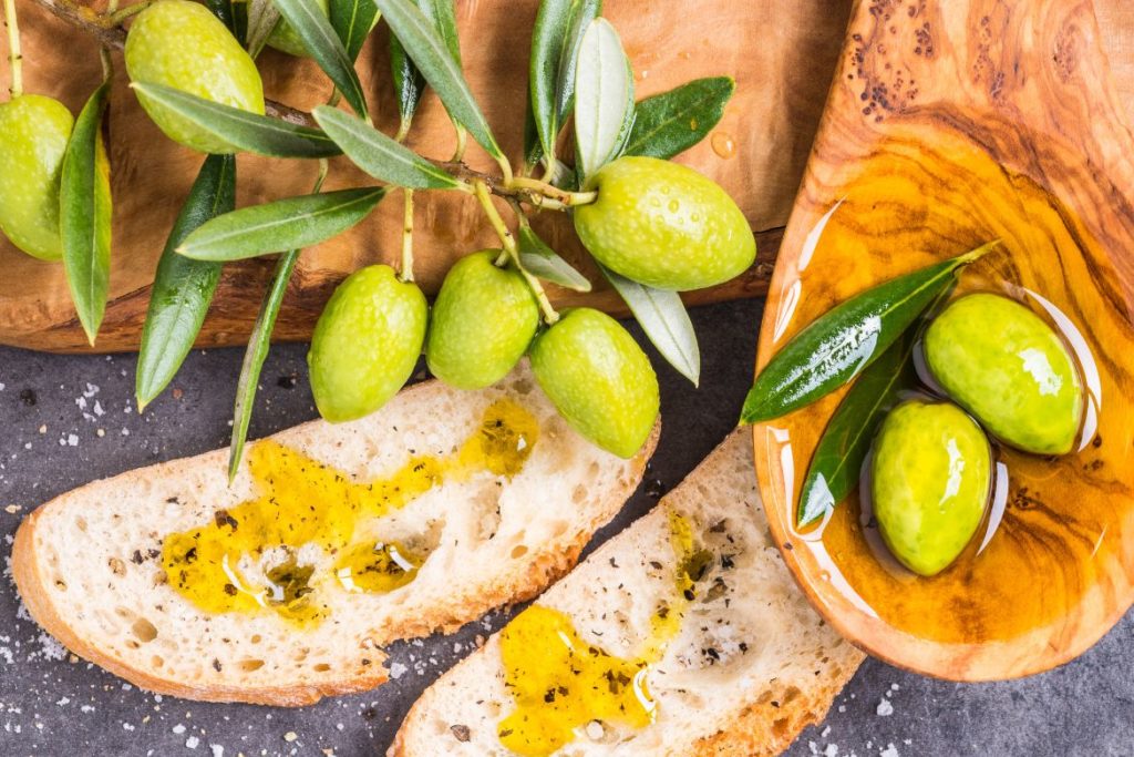 olives with olive oil on bread